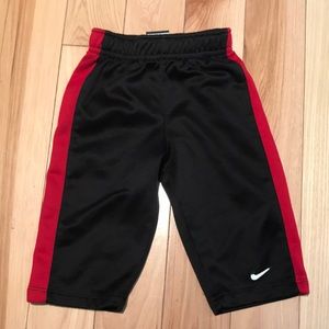 Nike 12 mo. Therma-Fit black pants with red stripe